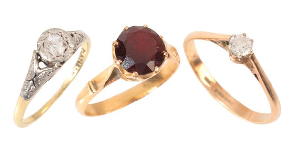 THREE GEM-SET RINGS