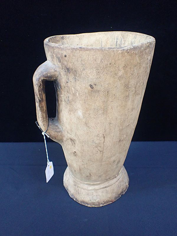 A WOODEN GRAIN SCOOP