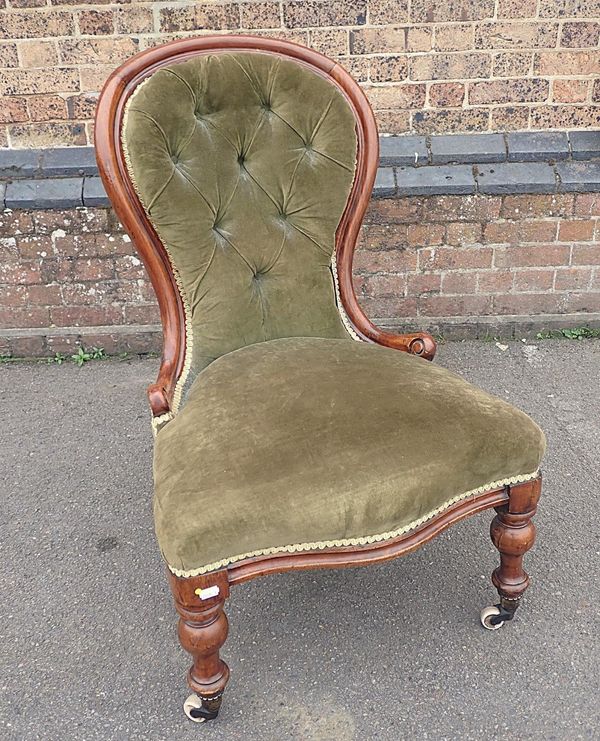 A VICTORIAN WALNUT FRAMED SPOONBACK NURSING CHAIR