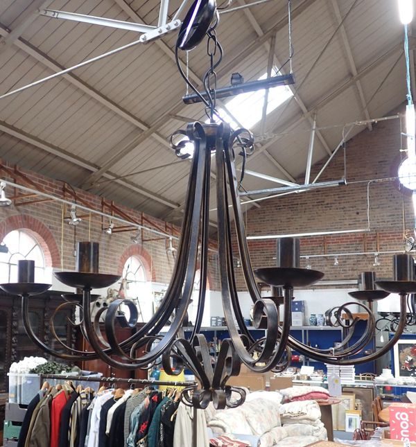 A  WROUGHT IRON CENTRAL PENDANT LIGHT FITTING