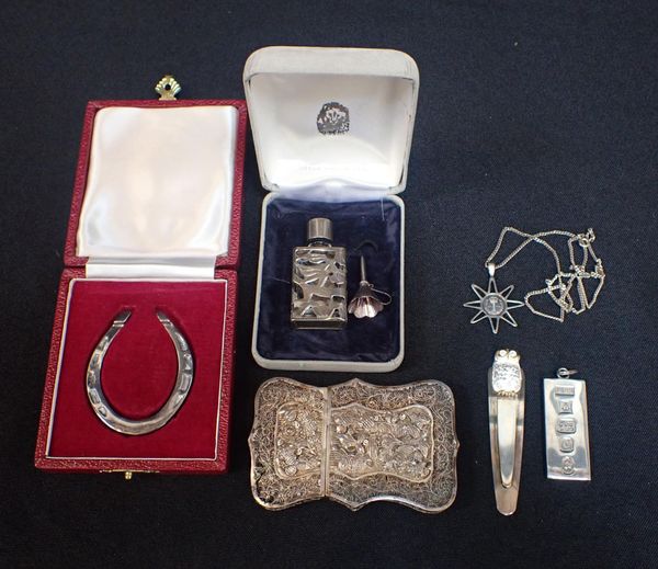 A SILVER FILIGREE CARD CASE