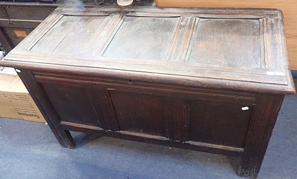 AN OAK PANELLED CHEST