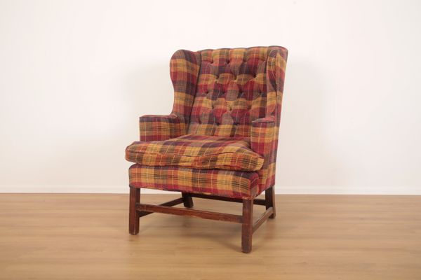 A WING ARMCHAIR IN GEORGIAN STYLE