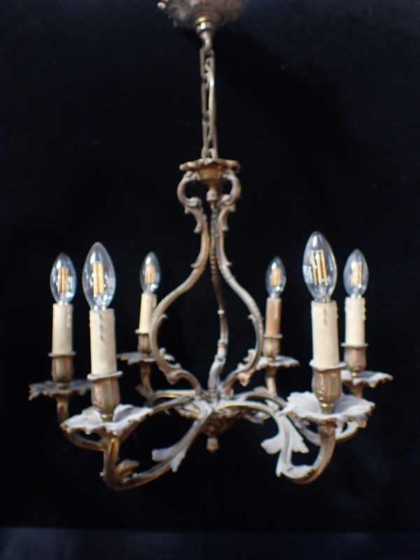 A SIX-BRANCH CAST BRASS ROCOCO STYLE CHANDELIER