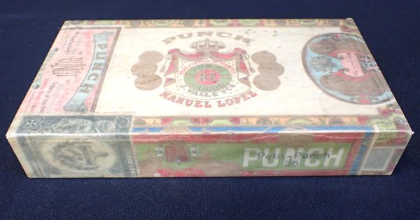 AN UNOPENED BOX OF MANUEL LOPEZ PETIT-PUNCH 25 CIGARS