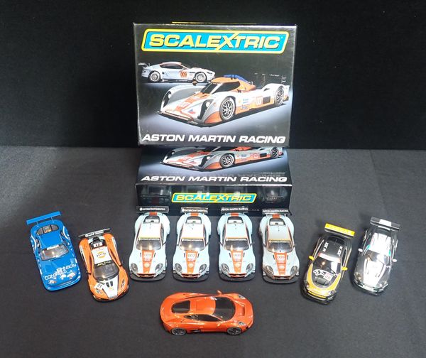 NINE UNBOXED SCALEXTRIC CARS