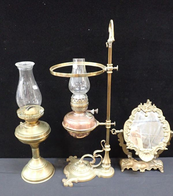 A VICTORIAN OIL LAMP WITH ADJUSTABLE ART NOUVEAU STYLE BRASS BASE