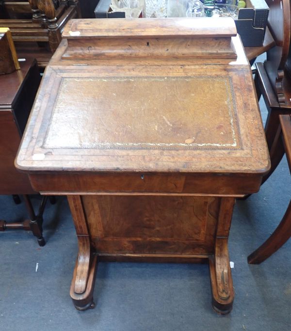 A VICTORIAN WALNUT DAVENPORT