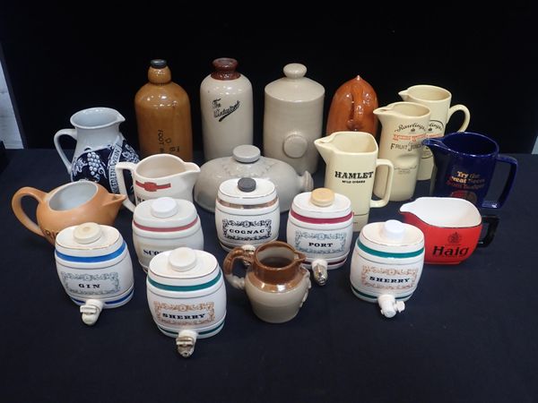 A COLLECTION OF PUB WATER JUGS