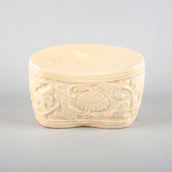 A CHINESE PORCELAIN WHITE WARE PILLOW