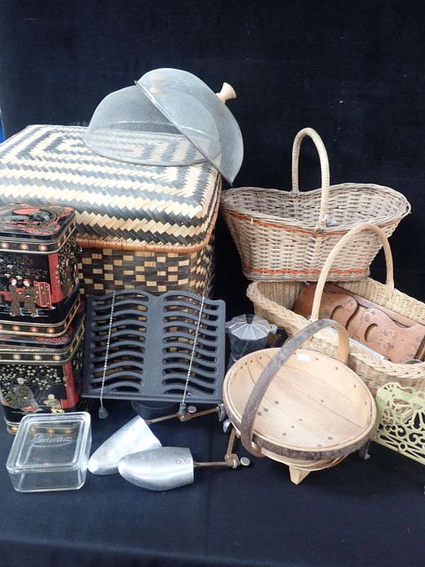 A CAST-IRON COOKERY BOOK STAND,  BASKETS