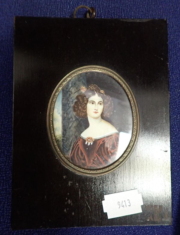 A MINIATURE PAINTED ON IVORY OF LADY IN RED DRESS WITH DARK HAIR