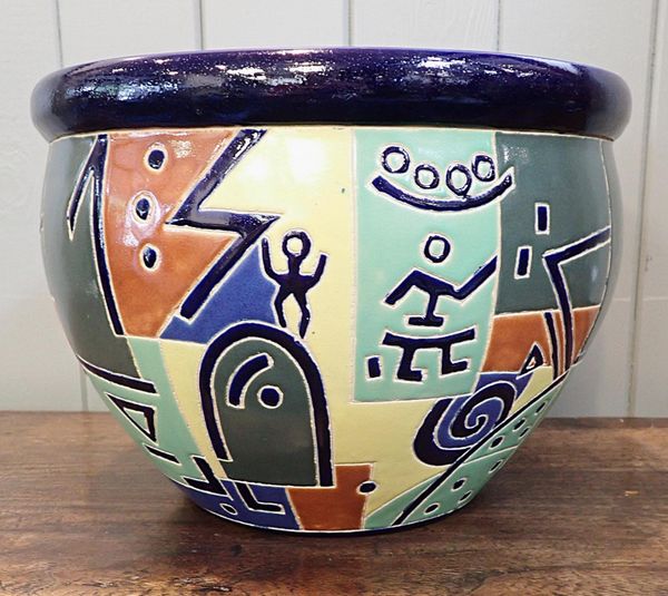 A CERAMIC JARDINIERE, WITH STYLIZED MODERN DECORATION