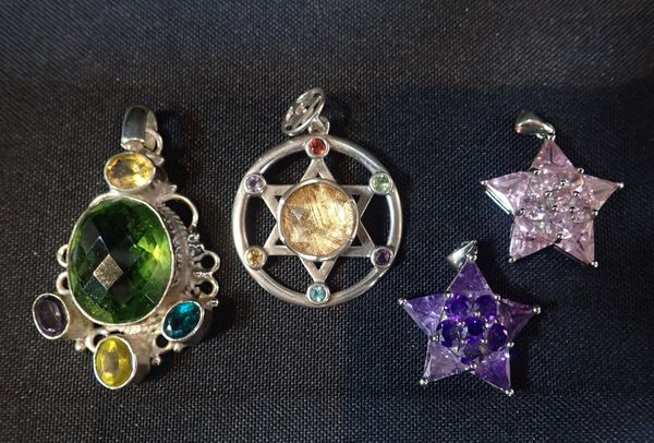 A 925 SILVER SIX-POINTED STAR 'METEORITE' PENDANT