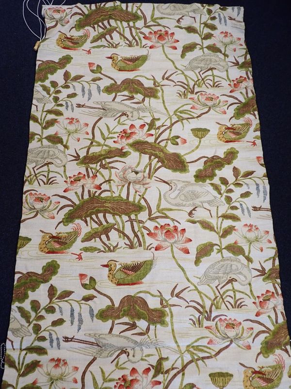 A PAIR OF ROMAN BLINDS IN 'HERON & LOTUS FLOWER' FABRIC