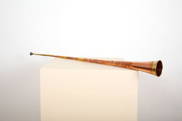 A 19TH CENTURY BRASS AND COPPER POST HORN BY J. HIGHAM OF MANCHESTER