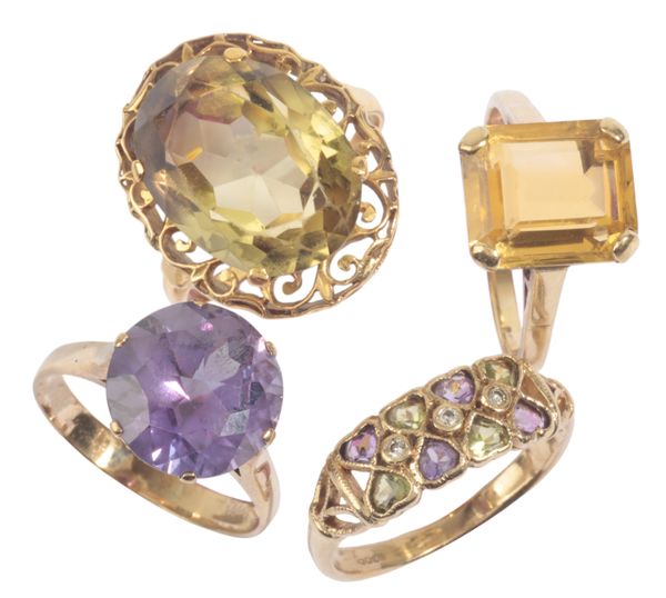 A COLLECTION OF FOUR GEM-SET RINGS
