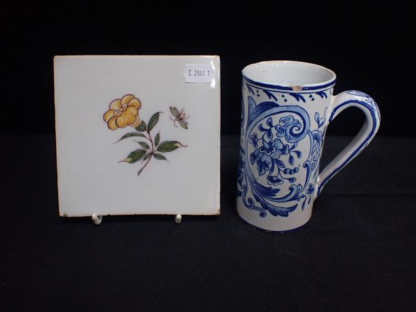 A DELFT MUG OF TALL PROPORTIONS