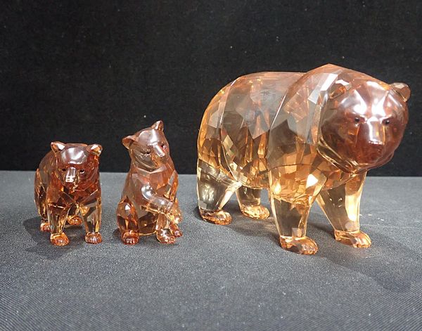 THREE SWAROVSKI AMBER GLASS BEARS