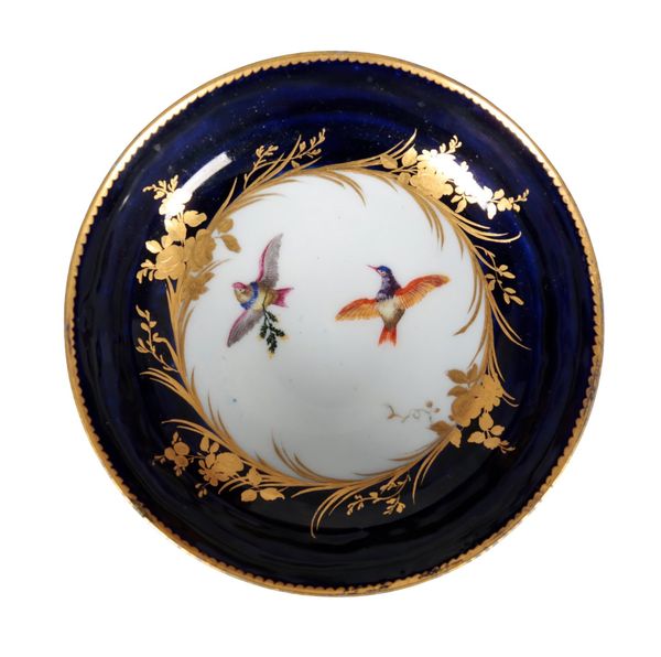 A VINCENNES BLUE LAPIS GROUND SAUCER