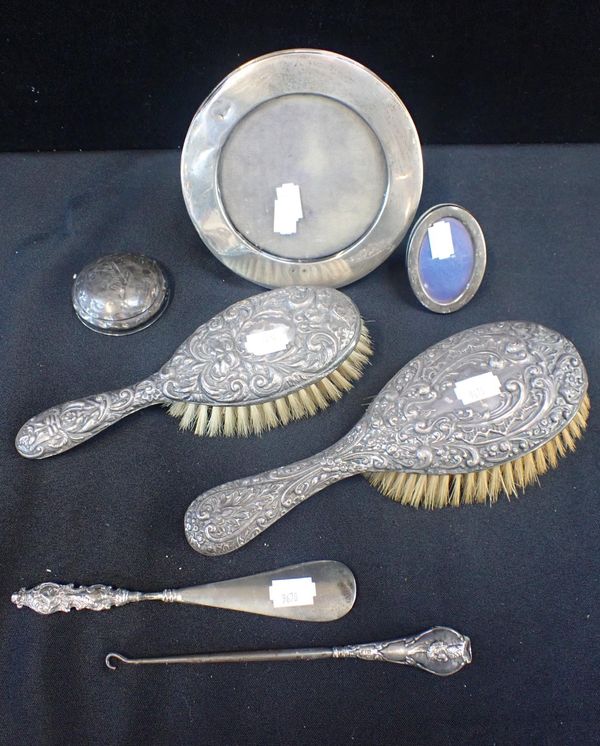 A SILVER BACKED BRUSH SET