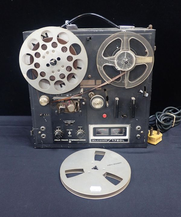 AN AKAI SOLID STATE 1720 L 4 TRACK STEREOPHONIC PLAYER