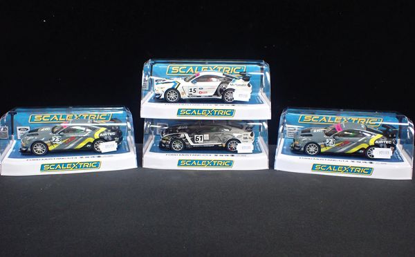 FOUR BOXED SCALEXTRIC 'FORD MUSTANG GT4' CARS