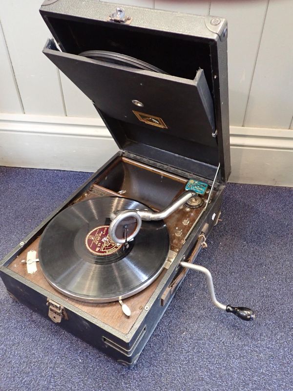 AN HMV PORTABLE GRAMOPHONE