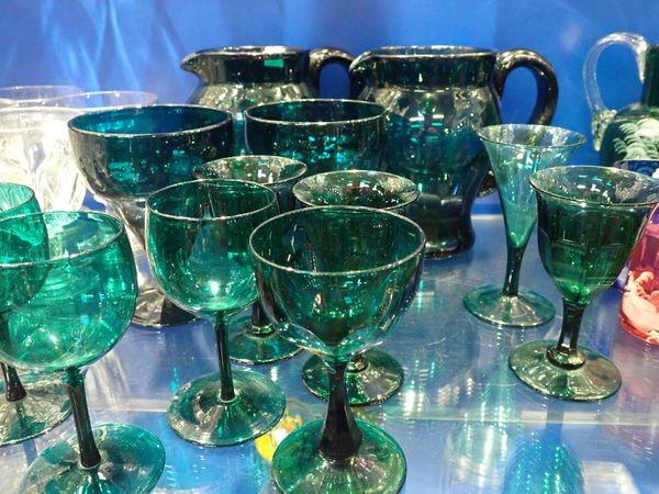 A PAIR OF 'BRISTOL' GREEN GLASS JUGS