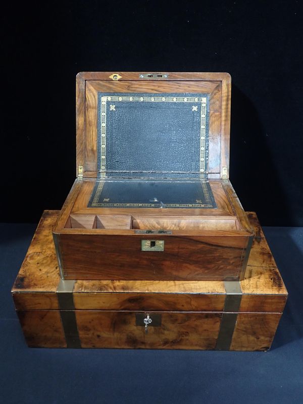 TWO WALNUT BRASS BOUND WRITING SLOPES