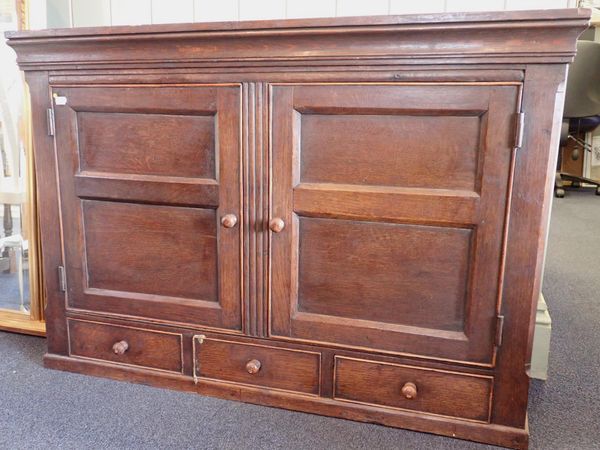 A 19th CENTURY COUNTRY OAK WALL MOUNTED CUPBOARD