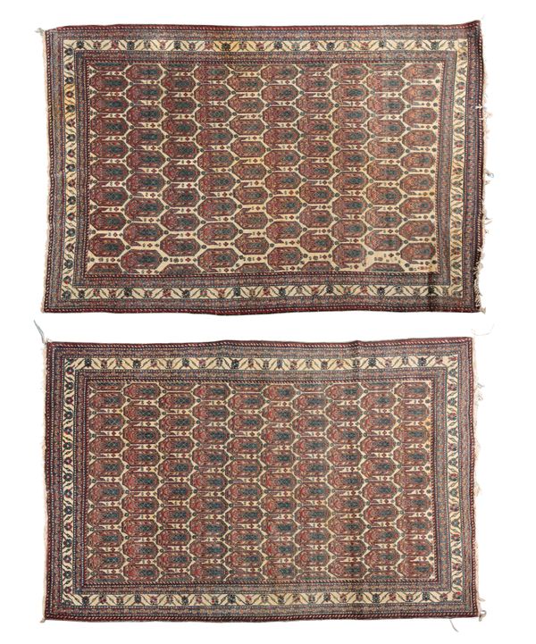 A PAIR OF ANTIQUE KASHAN CARPETS