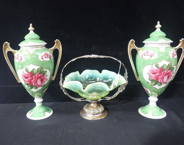 A PAIR OF CONTINENTAL GREEN GROUND VASES IN A CLASSICAL STYLE