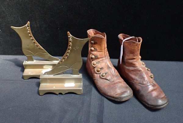 A PAIR OF LEATHER CHILD'S SIZE BUTTON BOOTS