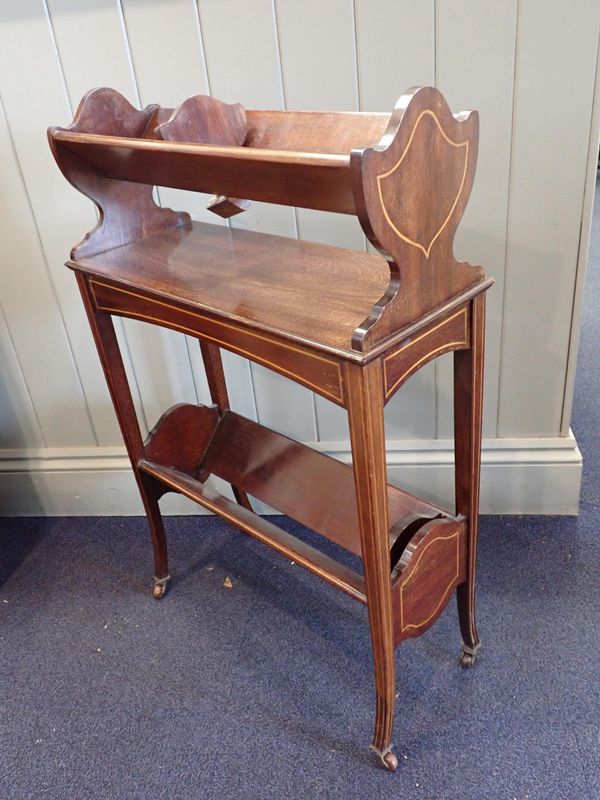AN EDWARDIAN MAHOGANY BOOK TABLE