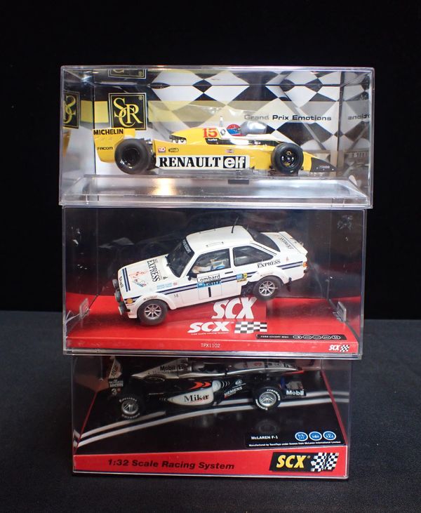 THREE BOXED SLOT CARS