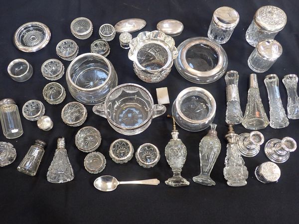 AN EDWARD VII SILVER MOUNTED CUT GLASS DRESSING TABLE BOWL