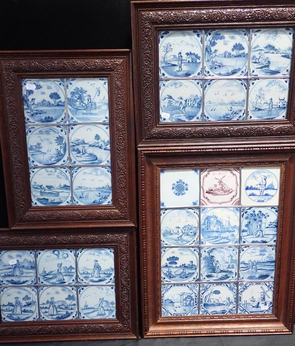 FOUR FRAMED DISPLAYS OF DELFT TILES