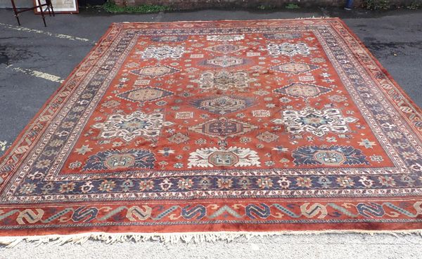 A LARGE MACHINE MADE CARPET