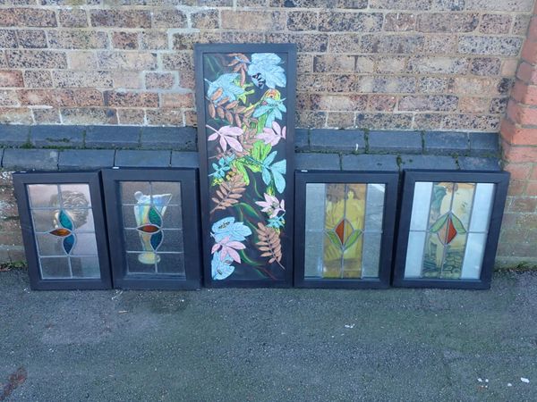 FOUR STAINED GLASS WINDOW PANELS