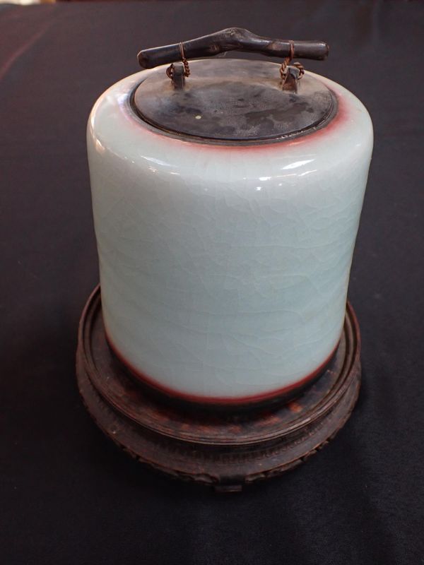 A PALE BLUE GLAZED PORCELAIN JAR