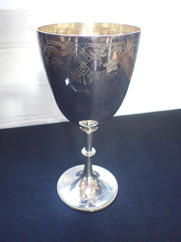 A VICTORIAN SILVER TROPHY CUP