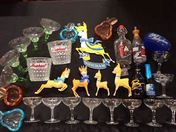 A COLLECTION OF BABYCHAM GLASSES