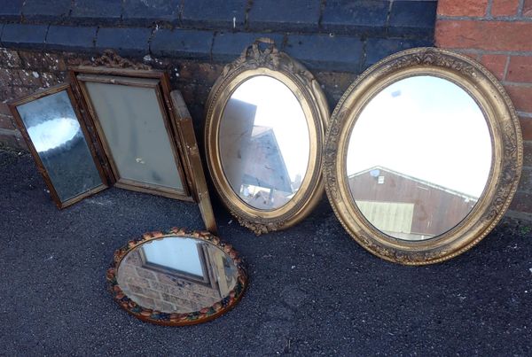 TWO 19th CENTURY OVAL GILT FRAMED MIRRORS