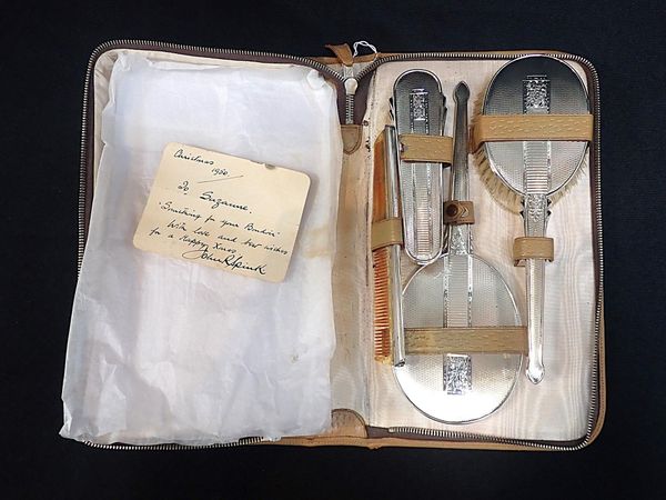 A FOUR-PIECE SILVER DRESSING TABLE SET