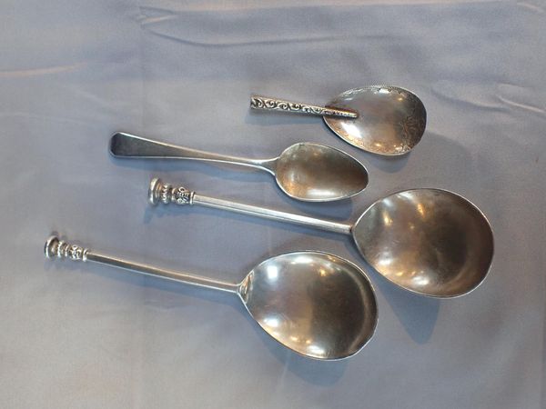 TWO SIMILAR SILVER SEAL-TOP SPOONS