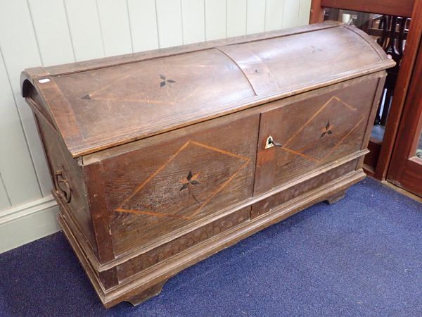 A 19th CENTURY OAK DOMED-TOP CHEST