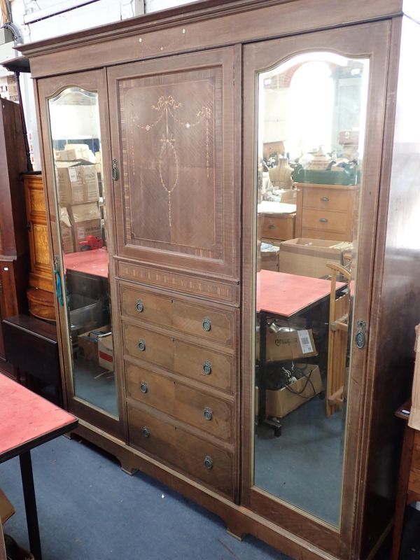 AN EDWARDIAN MAHOGANY TRIPLE WARDROBE