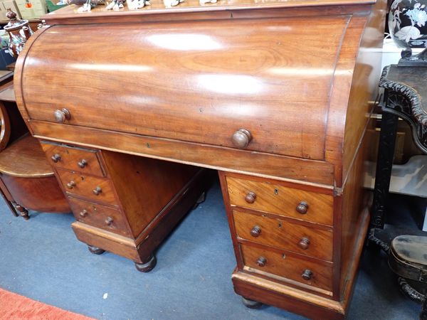 A VICTORIAN MAHOGANY CYLINDER BUREAU