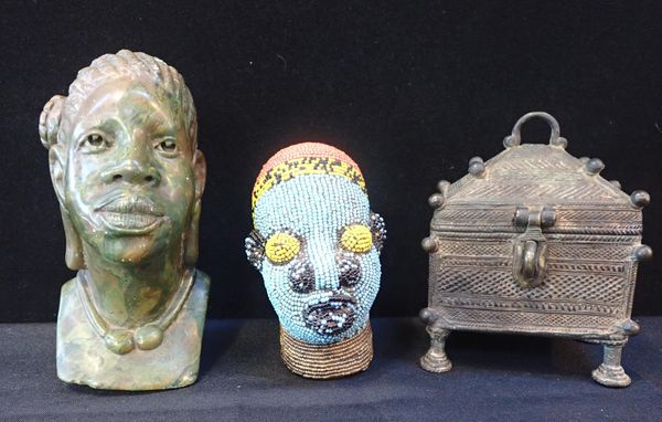 AN AFRICAN BEADED HEAD